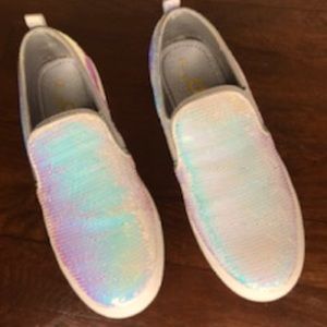Iridescent (white) sequin tennis shoes.